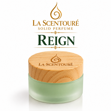 LA SCENTOURÉ REIGN luxury solid perfume 15g, frosted pastel-green jar with natural wood-finish lid